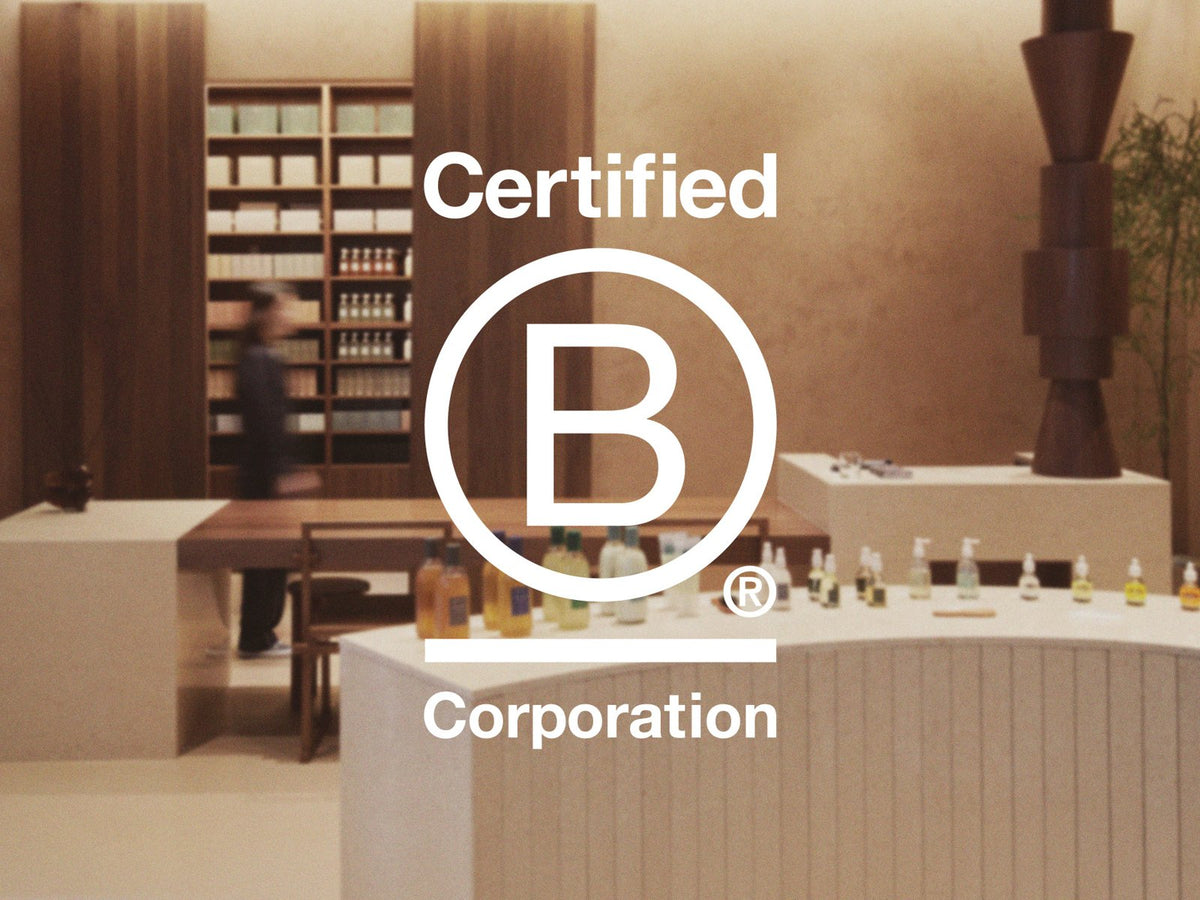 B Corp certification logo alongside an AROMATICA brand image